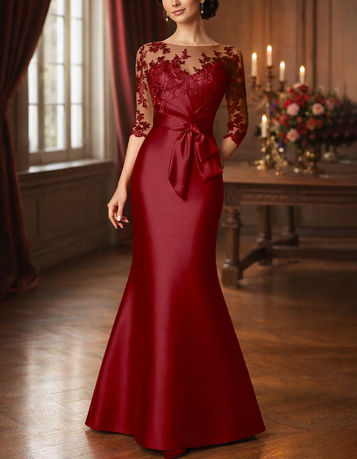 Satin maxi dress with fishtail design, lace patchwork, and solid color