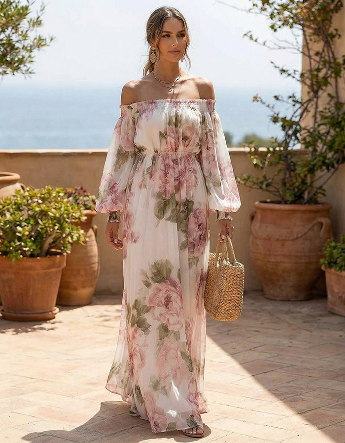 White chiffon maxi dress with pink rose print and off-shoulder design