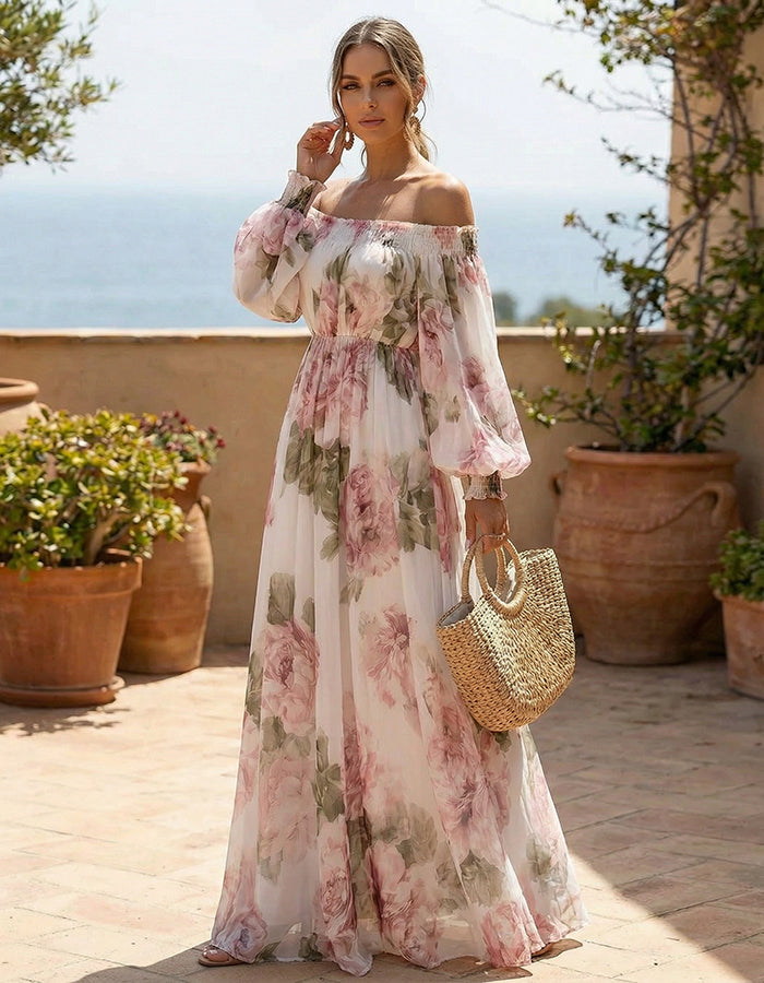White chiffon maxi dress with pink rose print and off-shoulder design