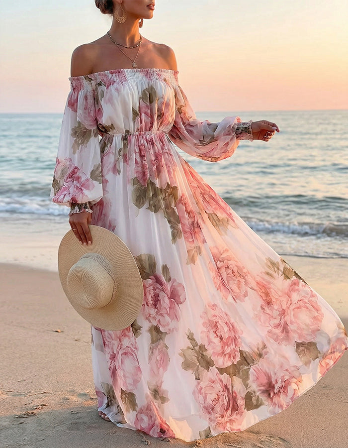 White chiffon maxi dress with pink rose print and off-shoulder design