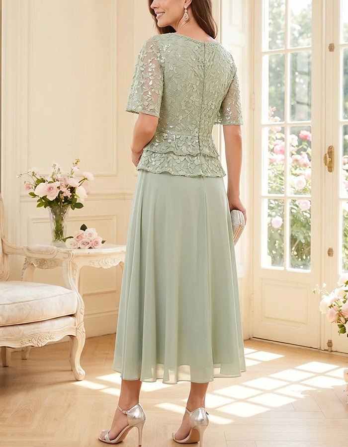 Midi dress made of flowing chiffon with round neck, lace, and sequins