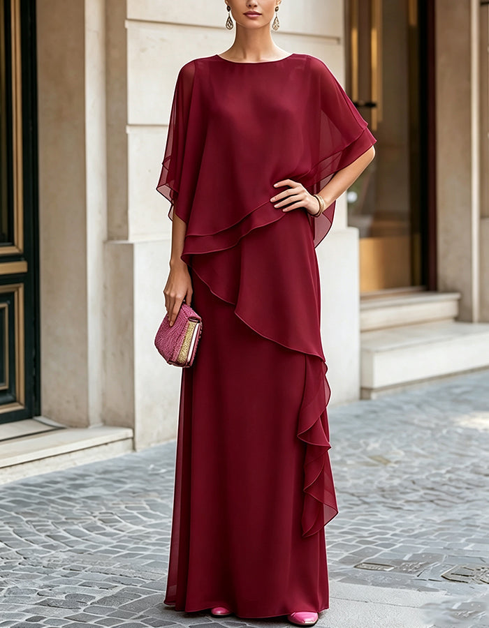 Fuchsia maxi dress made of flowing chiffon with a round neckline, side ruffles, and A-line