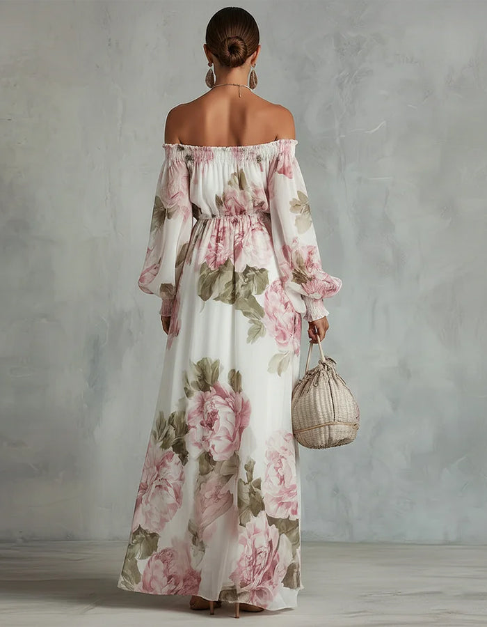 White chiffon maxi dress with pink rose print and off-shoulder design