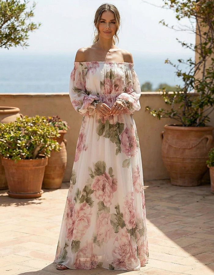 White chiffon maxi dress with pink rose print and off-shoulder design