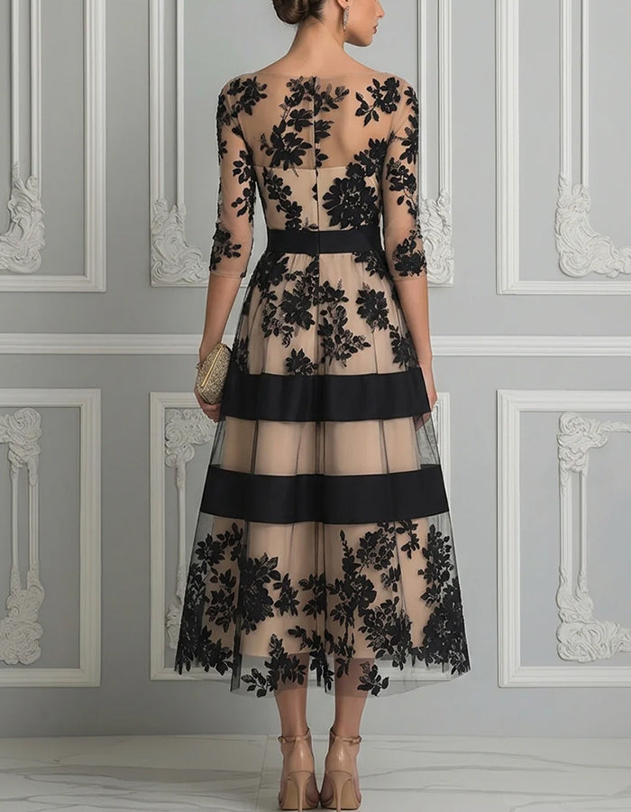 Black midi dress with floral lace, three-quarter sleeves, belt, and nude lining in A-line