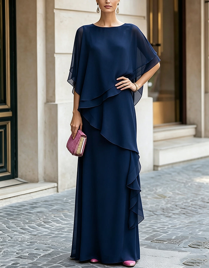 Fuchsia maxi dress made of flowing chiffon with a round neckline, side ruffles, and A-line