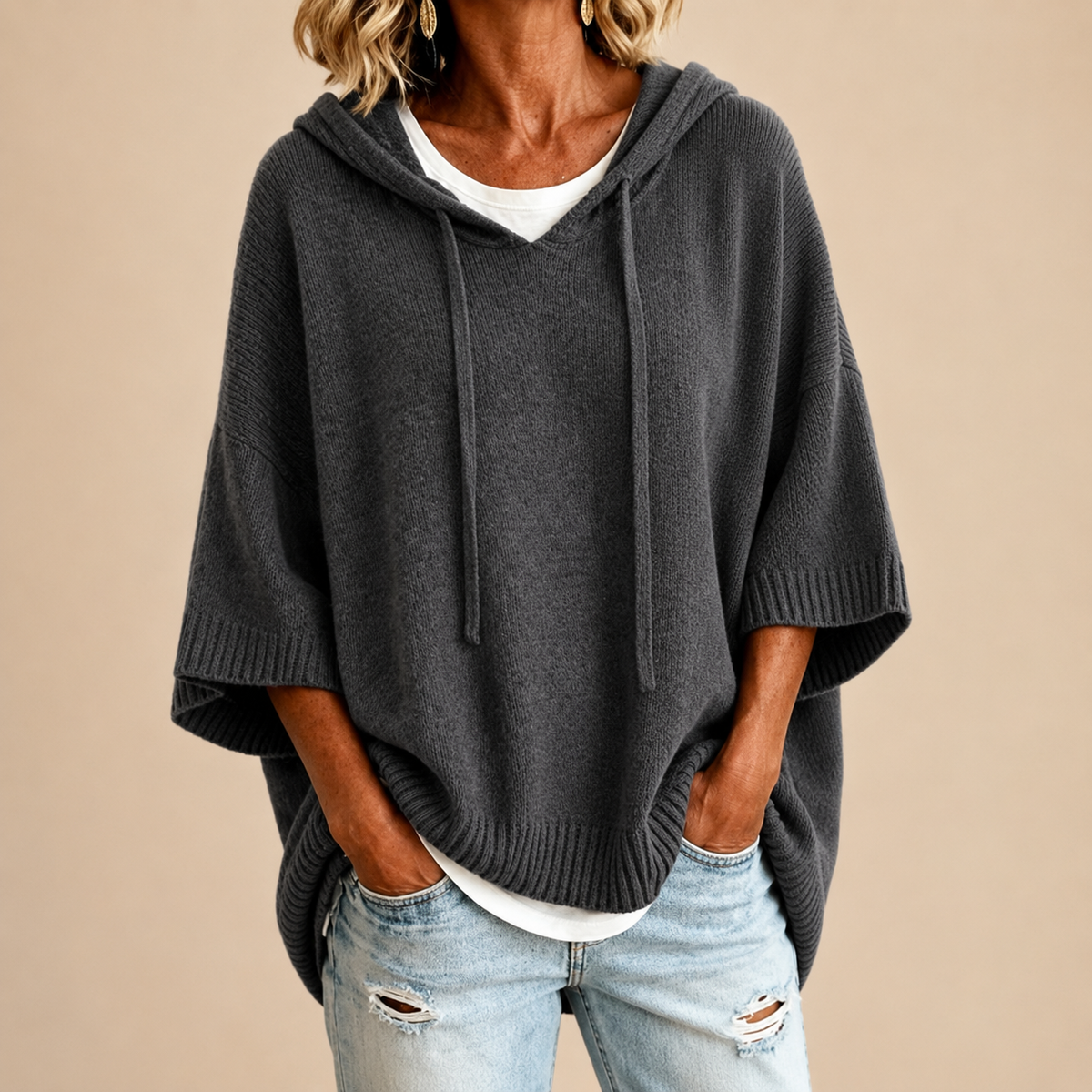 Oriana knitted poncho, three-quarter sleeves leaving the wrists free