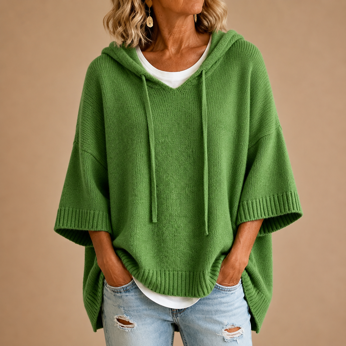 Oriana knitted poncho, side slits at the hem